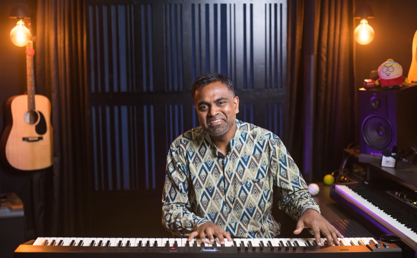 Jason Zac at the piano in his Bangalore studio
