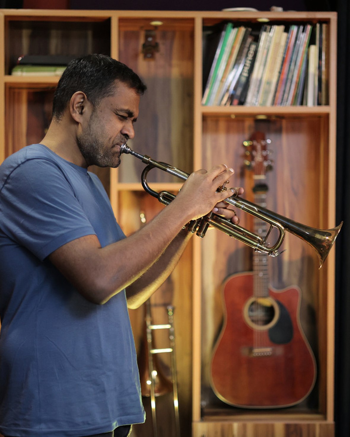 Jason Zac playing the trumpet